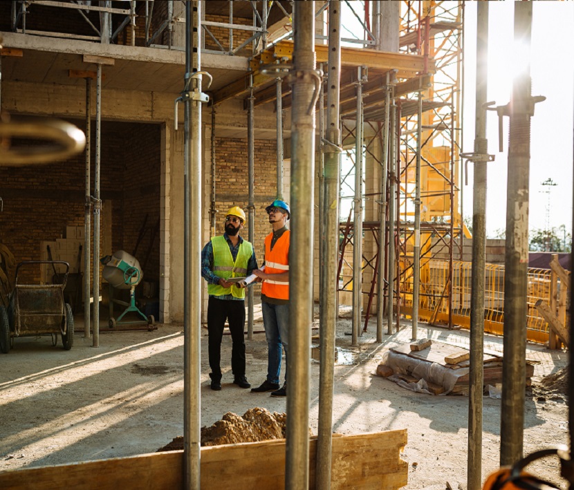 Scaffolding Services Engineers discussing scaffold construction
